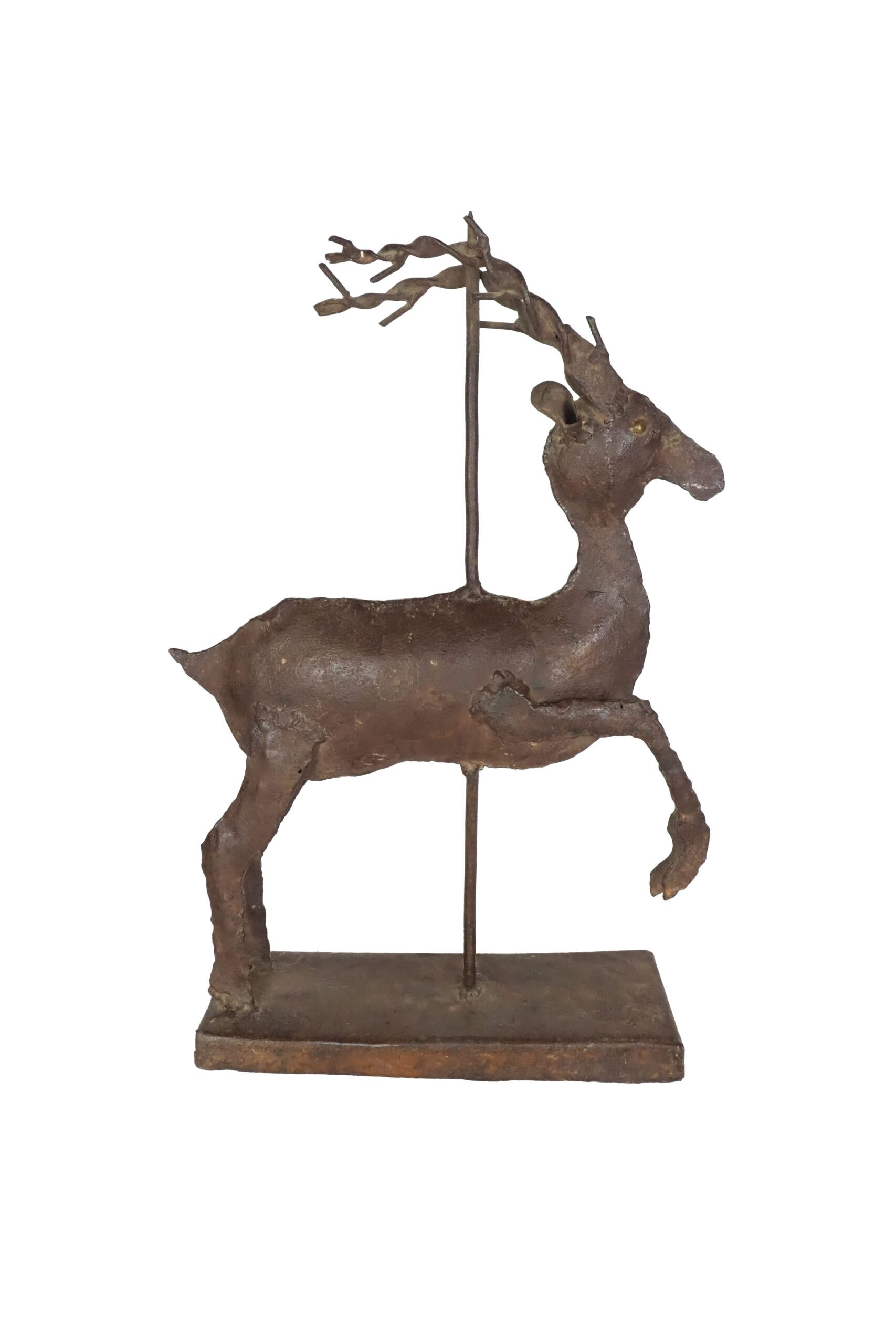 A Folk Art Reindeer Candlestick. This characterful Indian metal deer is hand crafted from reclaimed rusty metal. Sourced by Wildmore.