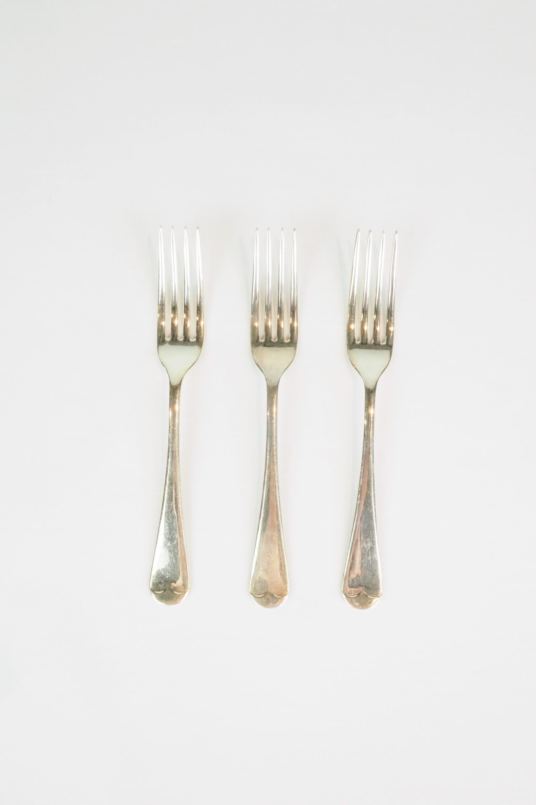 This set of 3 Antique Silver Plate Forks have a wonderful stone washed patina to the silver plate.