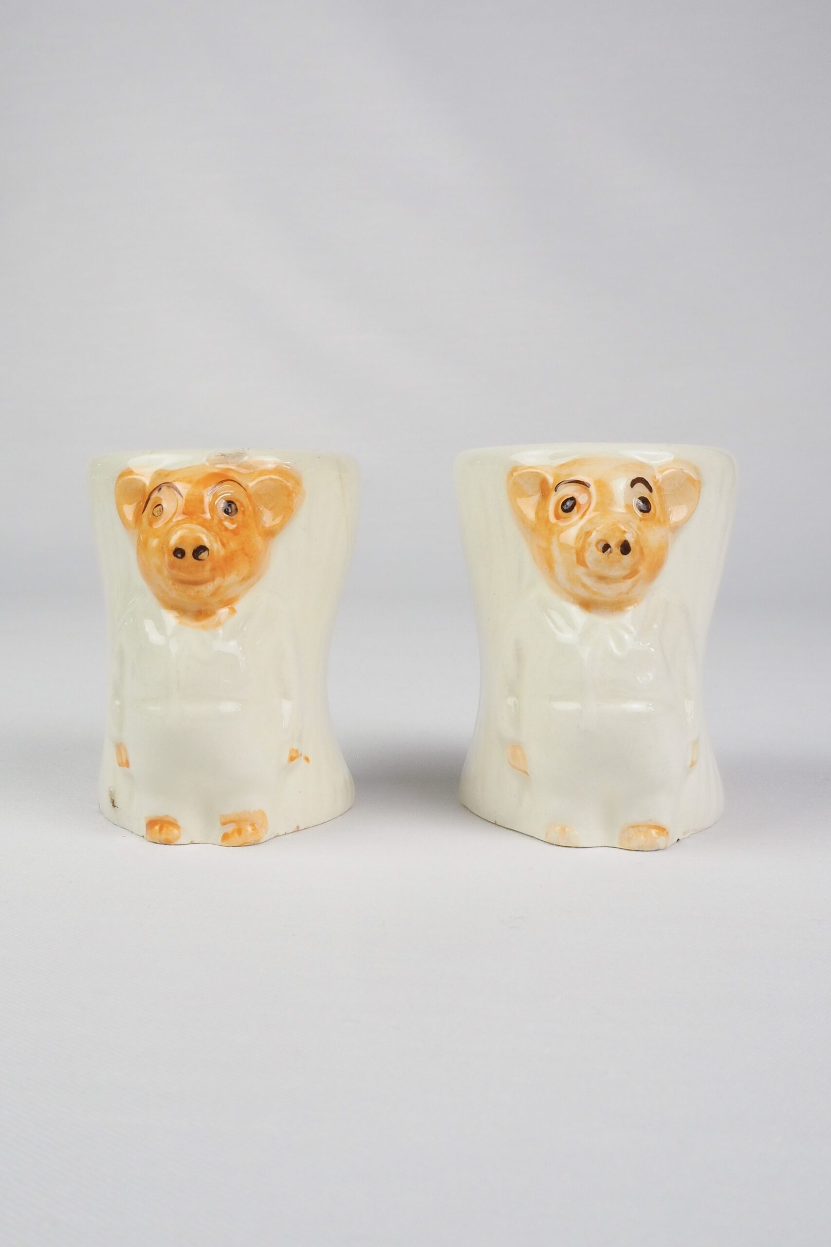 This pair of characterful little Vintage Pinky and Perky Egg Cups are the perfect addition to your breakfast table. These nostalgic little characters were originally created in the late 1950s for British television. Pig Egg cups