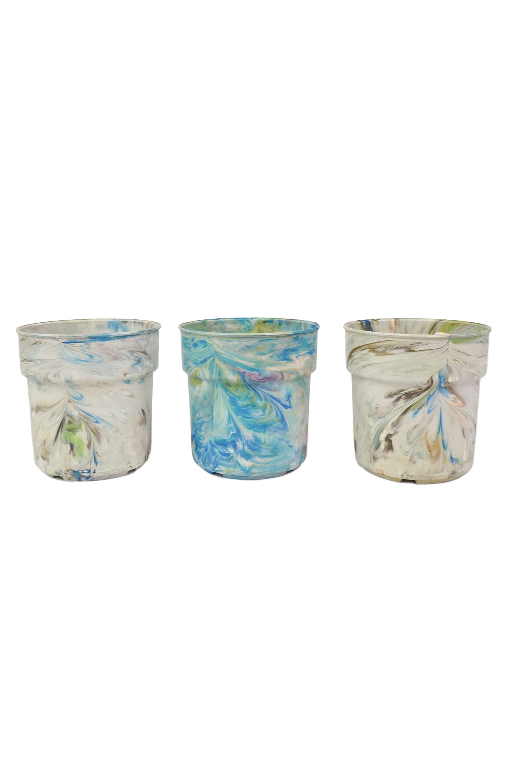 A rare trio of vintage 1970s planters. This curated collection of 3 Vintage Marbled Plant Pots have been curated from a rare collection of retro planters.