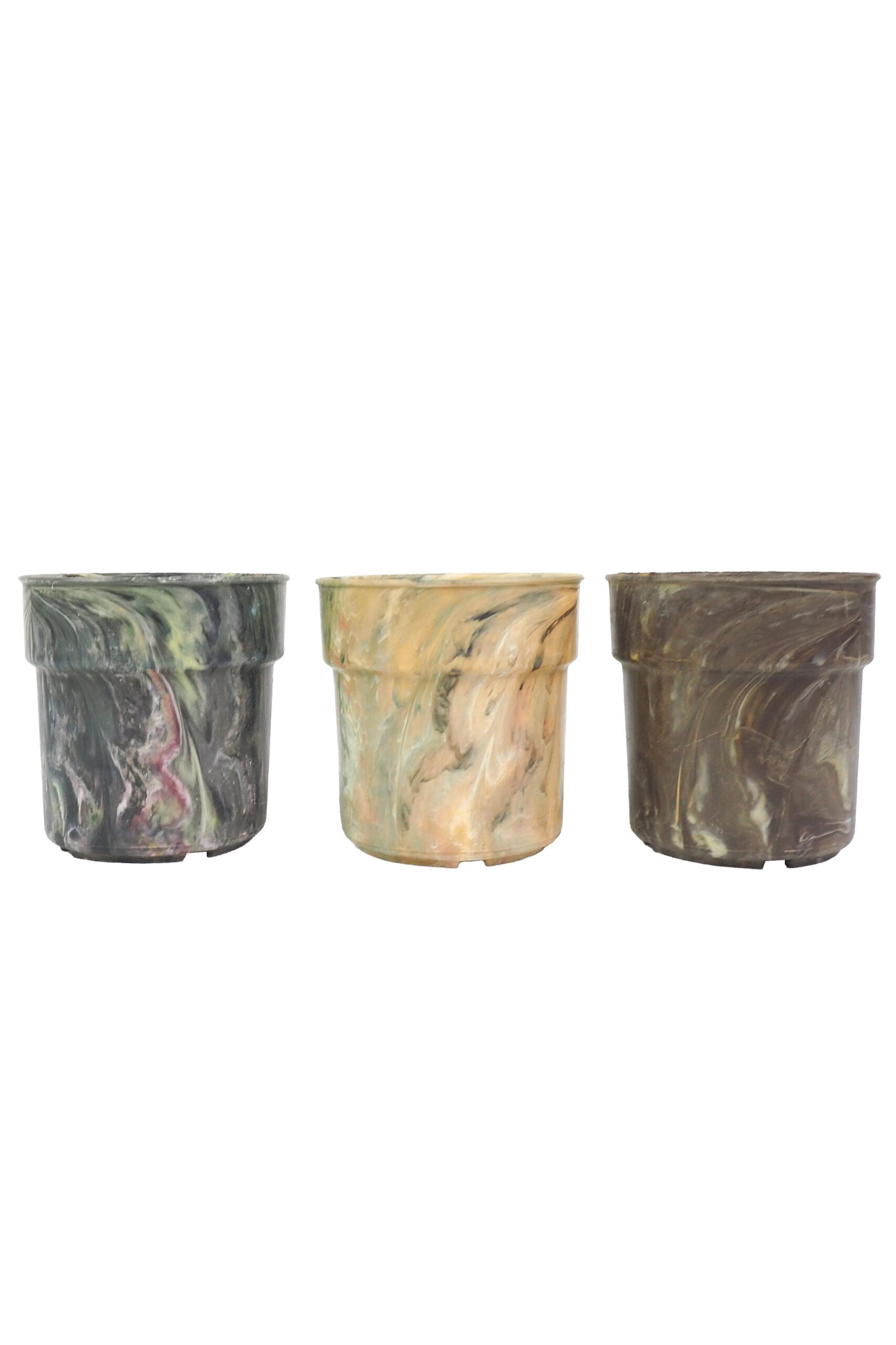 A rare trio of vintage 1970s planters. This curated collection of 3 Vintage Marbled Plant Pots have been curated from a rare collection of retro planters.