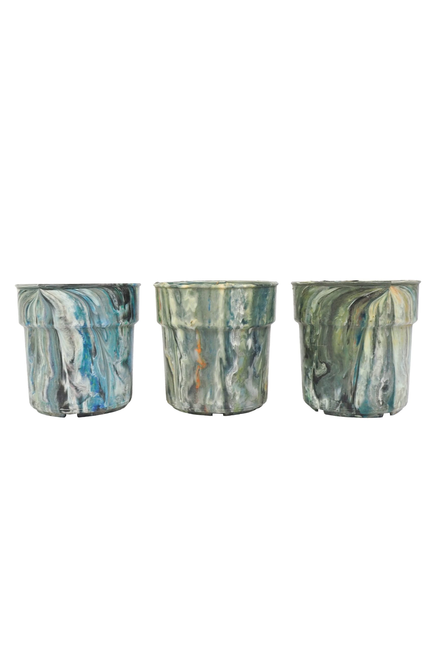 A rare trio of vintage 1970s planters. This curated collection of 3 Vintage Marbled Plant Pots have been curated from a rare collection of retro planters.