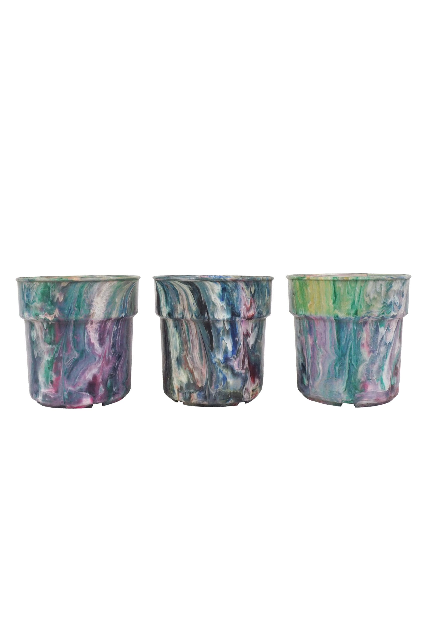 A rare trio of vintage 1970s planters. This curated collection of 3 Vintage Marbled Plant Pots have been curated from a rare collection of retro planters.