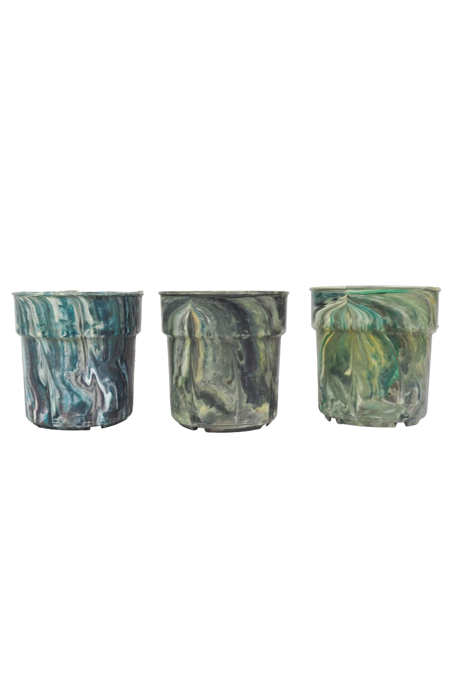 A rare trio of vintage 1970s planters. This curated collection of 3 Vintage Marbled Plant Pots have been curated from a rare collection of retro planters.