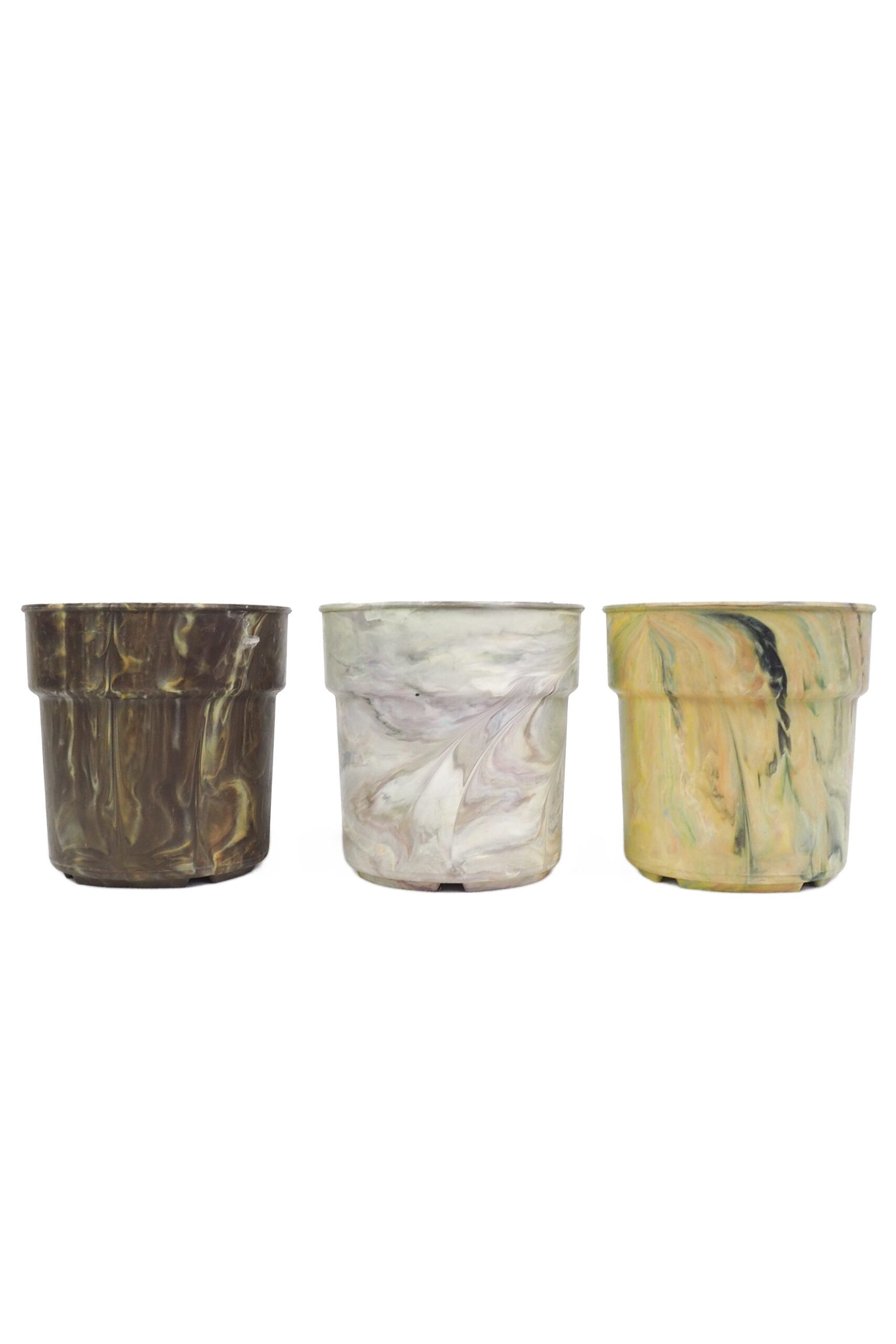 A rare trio of vintage 1970s planters. This curated collection of 3 Vintage Marbled Plant Pots have been curated from a rare collection of retro planters.