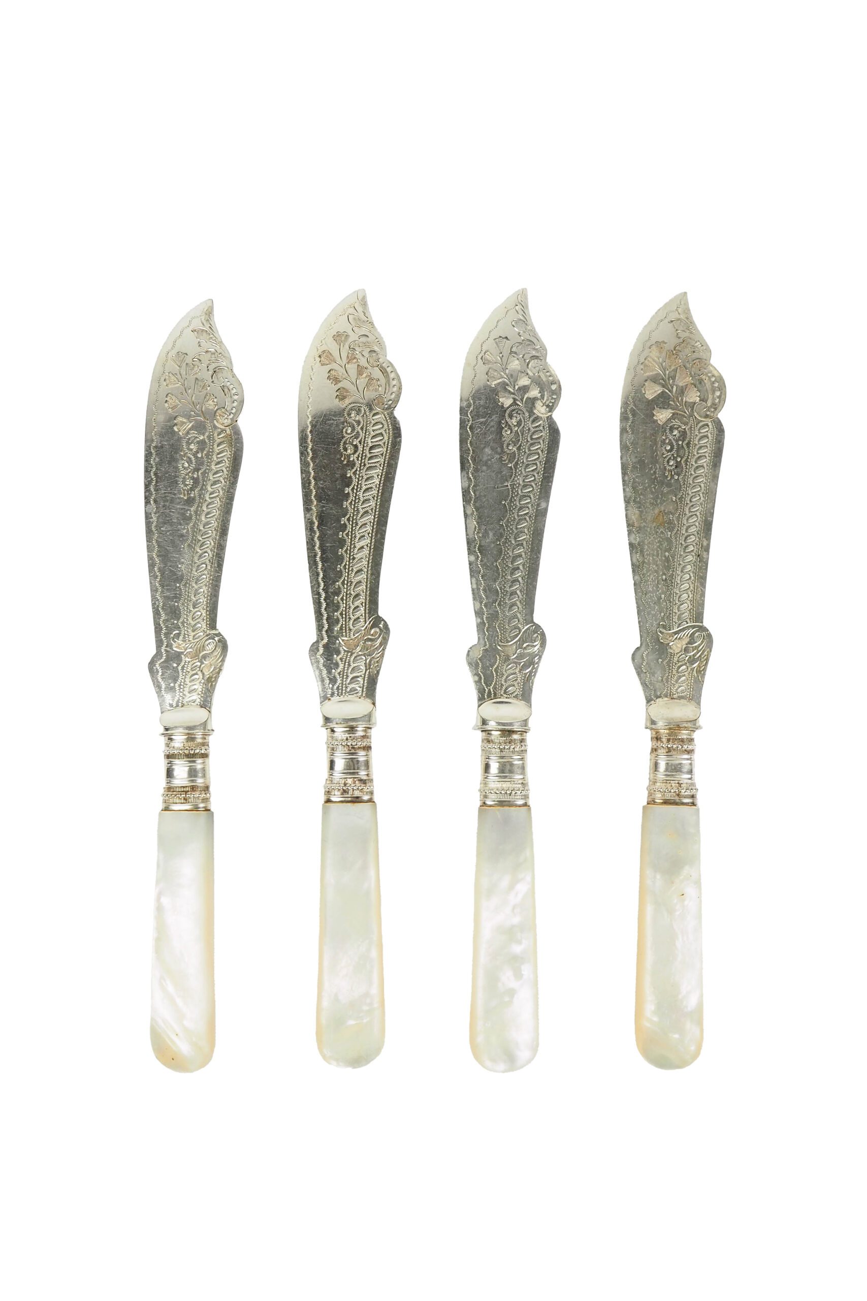 A Set of 4 Antique Silver Plate Fish Knives with mother of pearl handles. The blade of each Victorian Fish Knife has a beautifully etched floral pattern. Wildmore