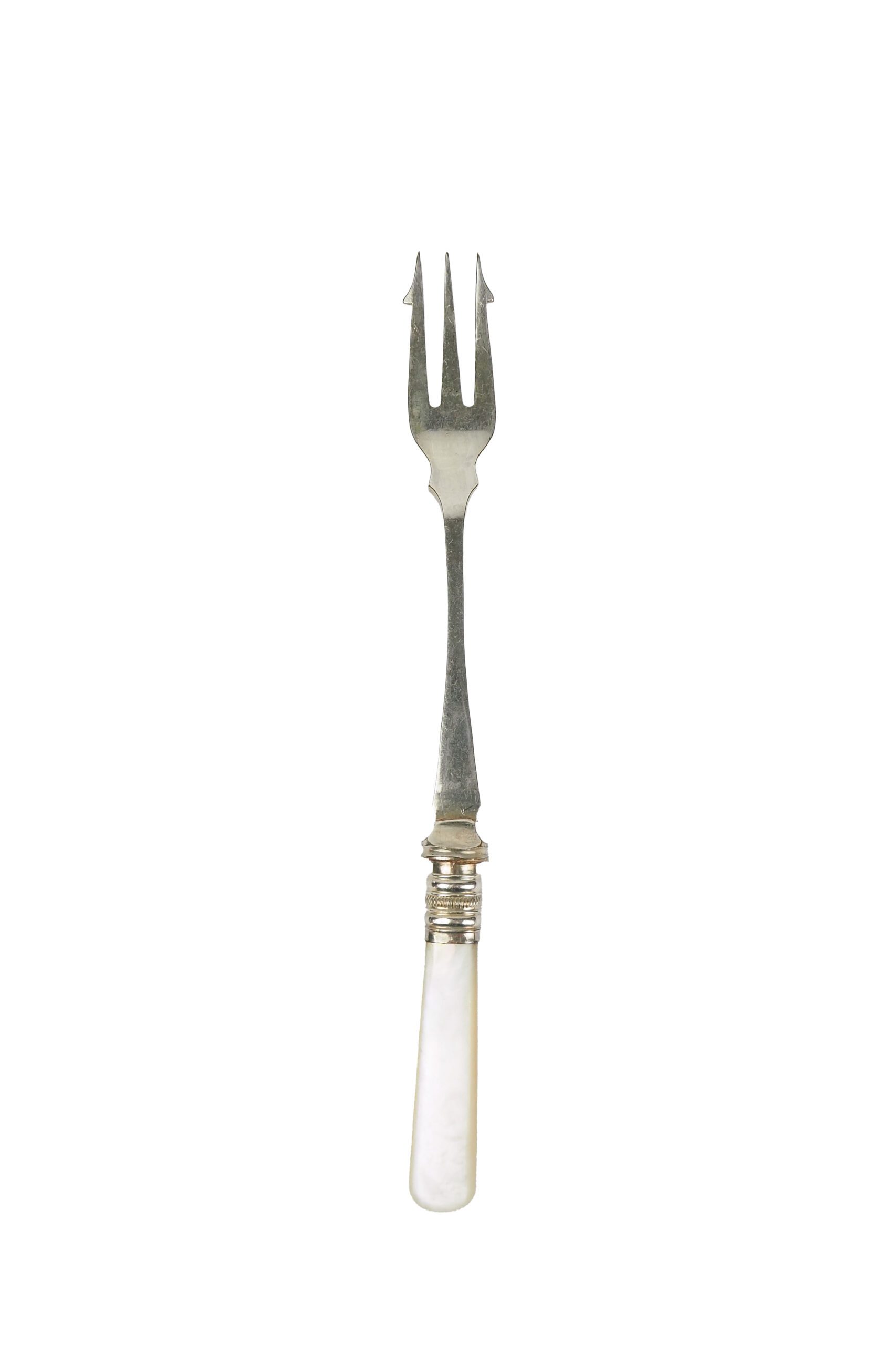 This Antique Pickle Fork has a beautiful Mother of Pearl handle, a Silver Plated neck and barbed prongs. Wildmore