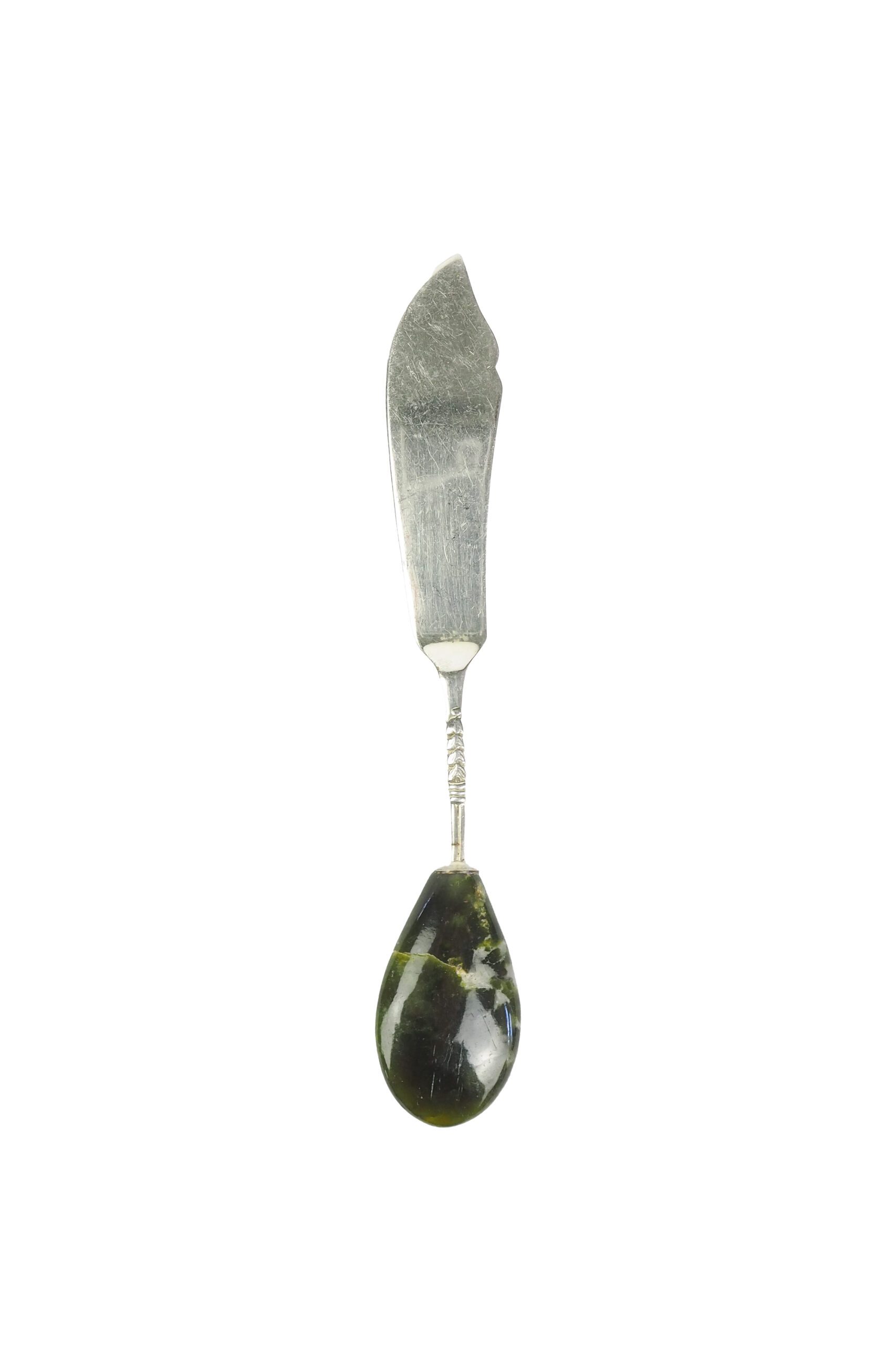 This Vintage Agate Butter Knife has a silver plated blade and a beautiful moss agate handle.