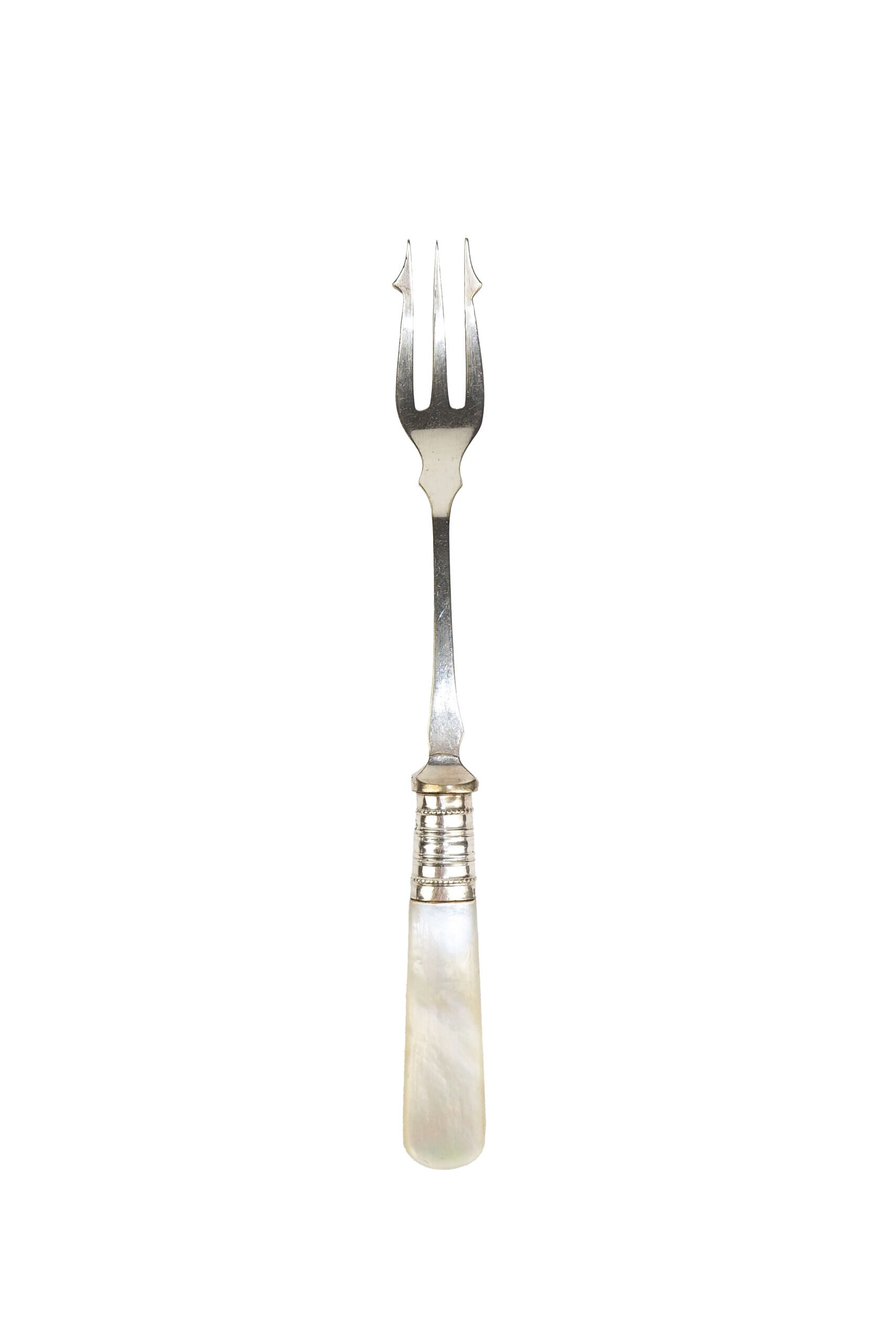 This Antique Pickle Fork has a beautiful Mother of Pearl handle, a Silver Plated neck and barbed prongs. Wildmore