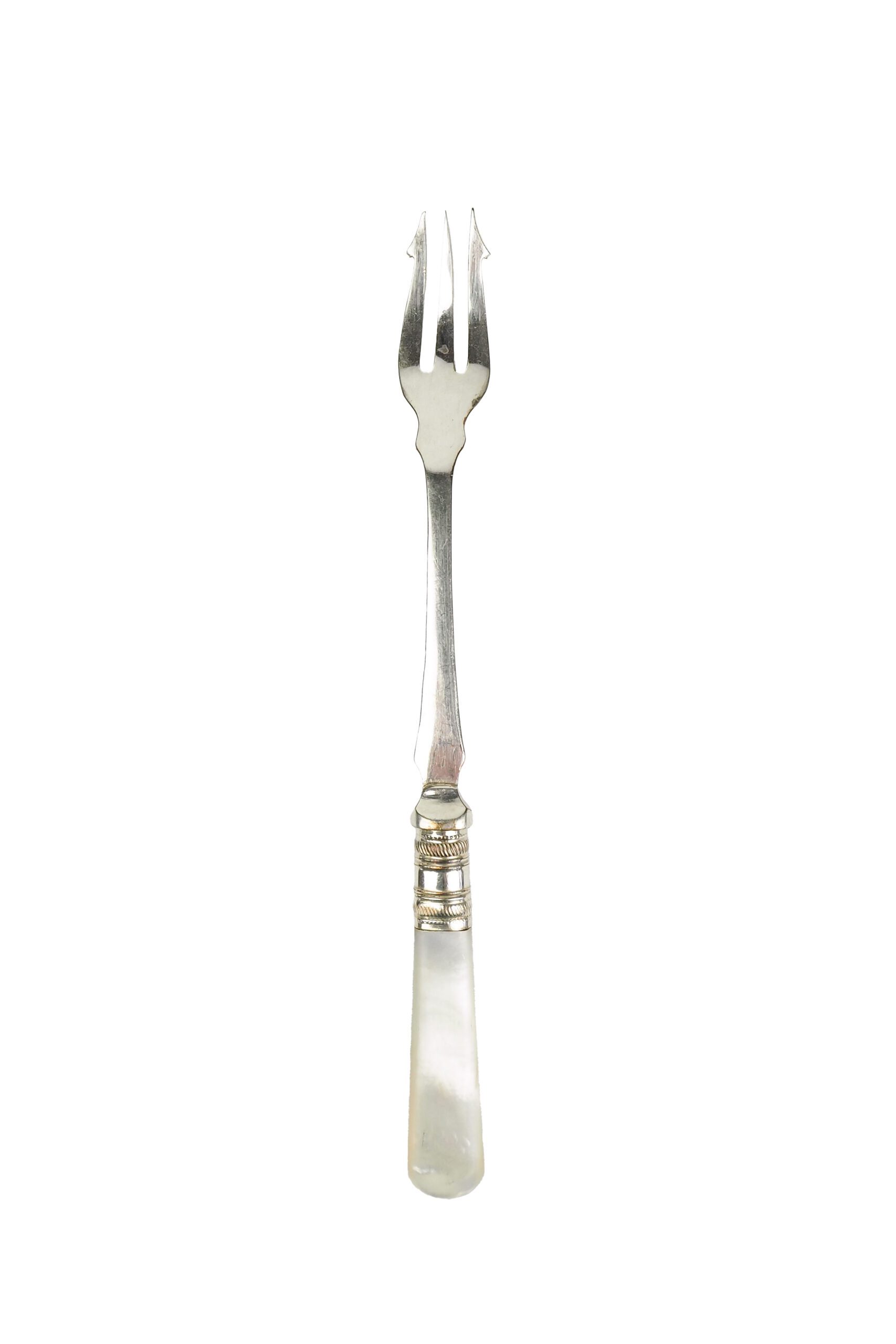 This Antique Pickle Fork has a beautiful Mother of Pearl handle, a Silver Plated neck and barbed prongs. Wildmore