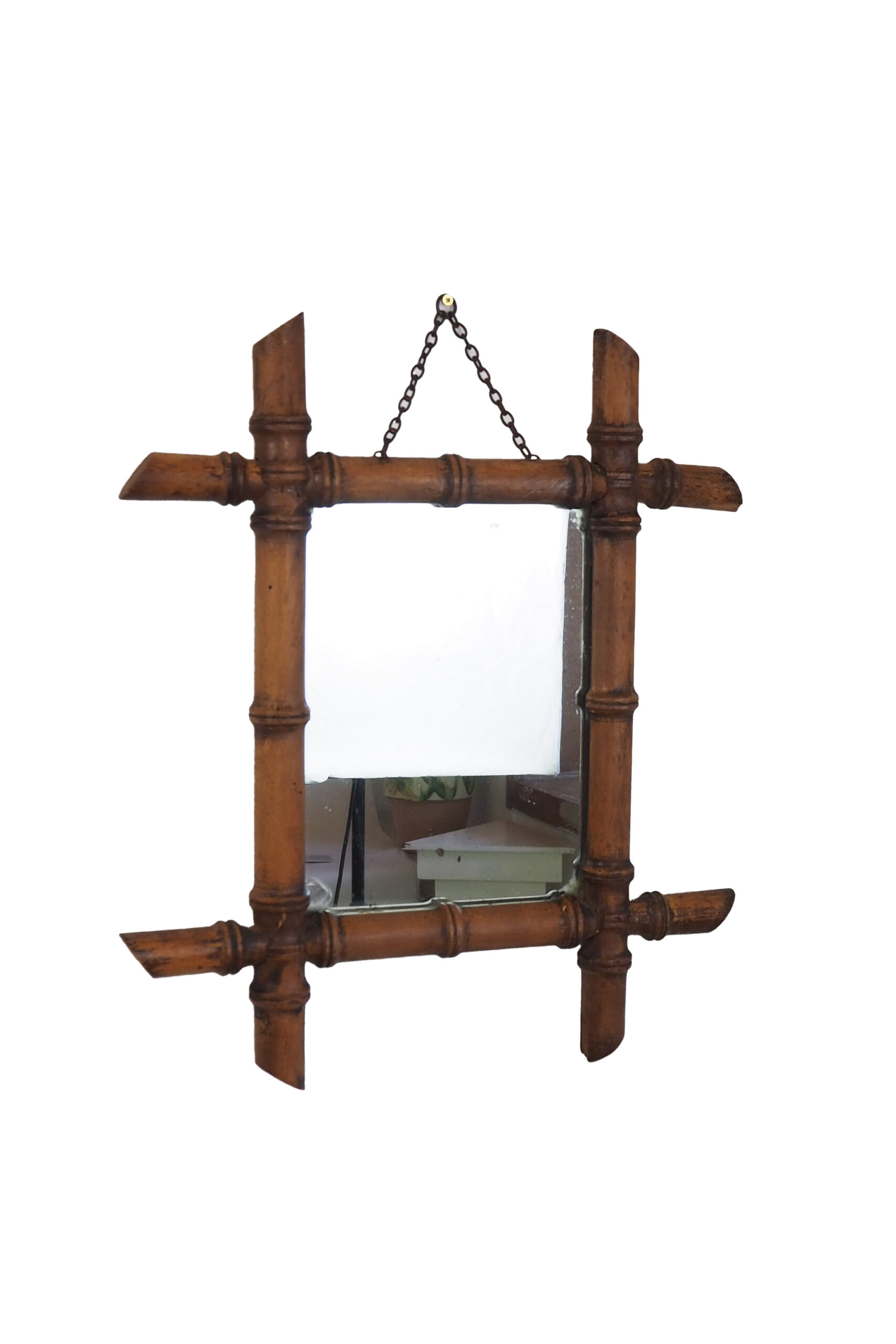 A stunning example of an early Antique French Faux Bamboo Mirror. This beautifully foxed glass is framed by a hand turned wooden frame.