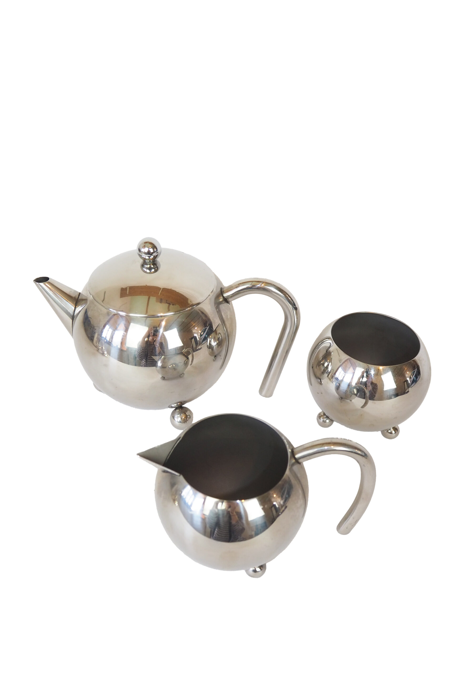 A Vintage Atomic Tea Set by Henley. This wonderful tea set includes a teapot, milk jug and sugar bowl all in the timeless atomic style.
