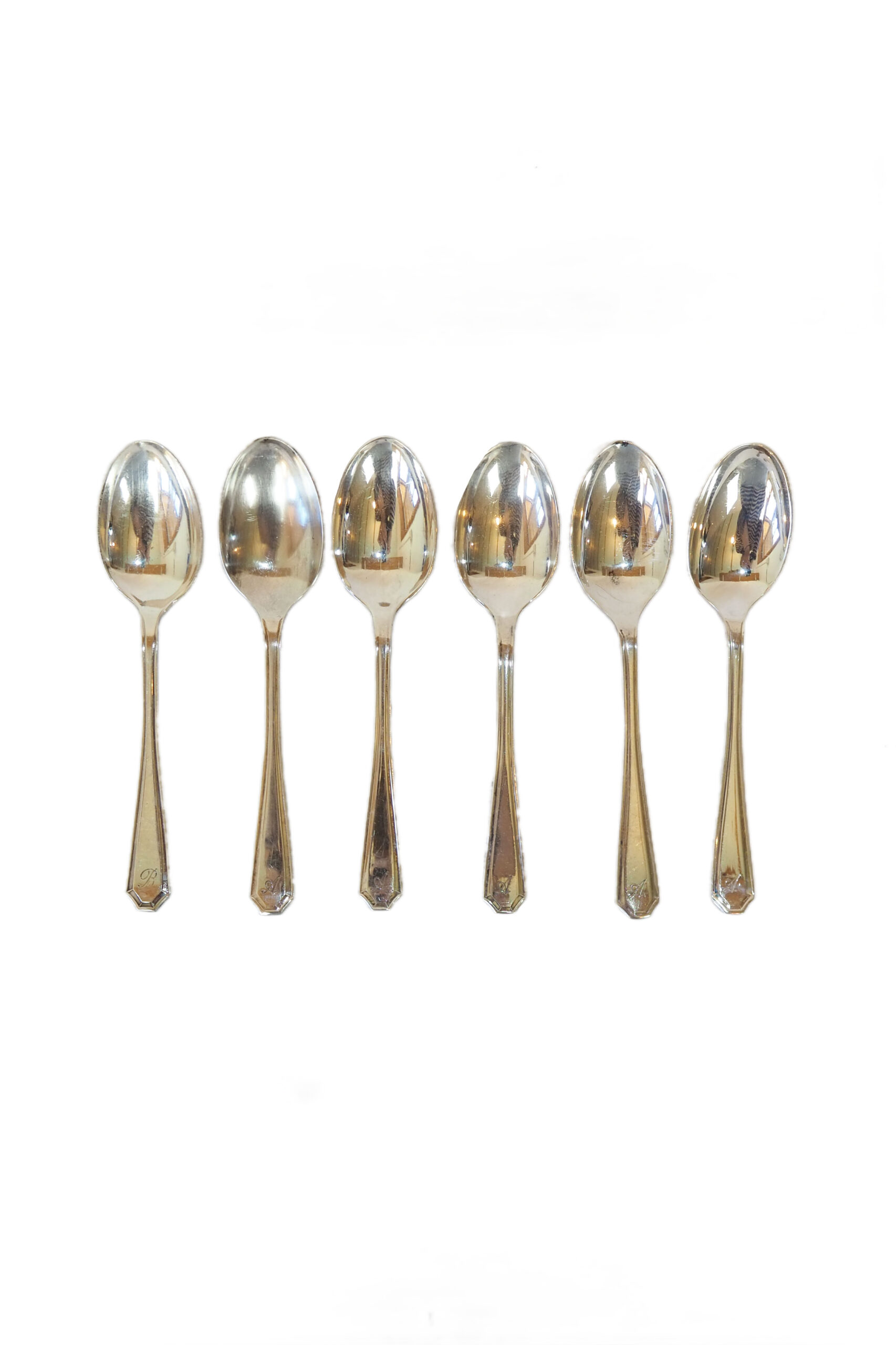 This set of 6 Vintage Silver Plate Teaspoons are monogrammed A and B. The stylish handles give a classic look to these antique teaspoons.